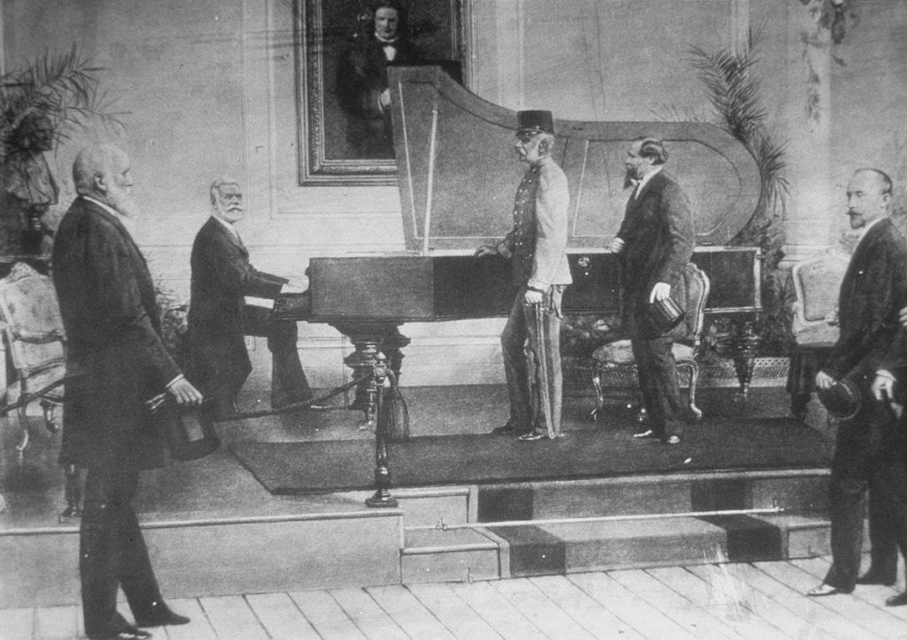 Ludwig Bösendorfer, Bösendorfer Grand adlı büyük şasesini Avusturya İmparatoru I. Franz Joseph'e sunuyor.